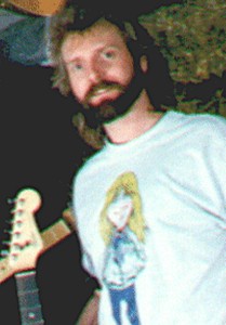 Dave Michael Valentine sporting Larry Norman cartoon on shirt